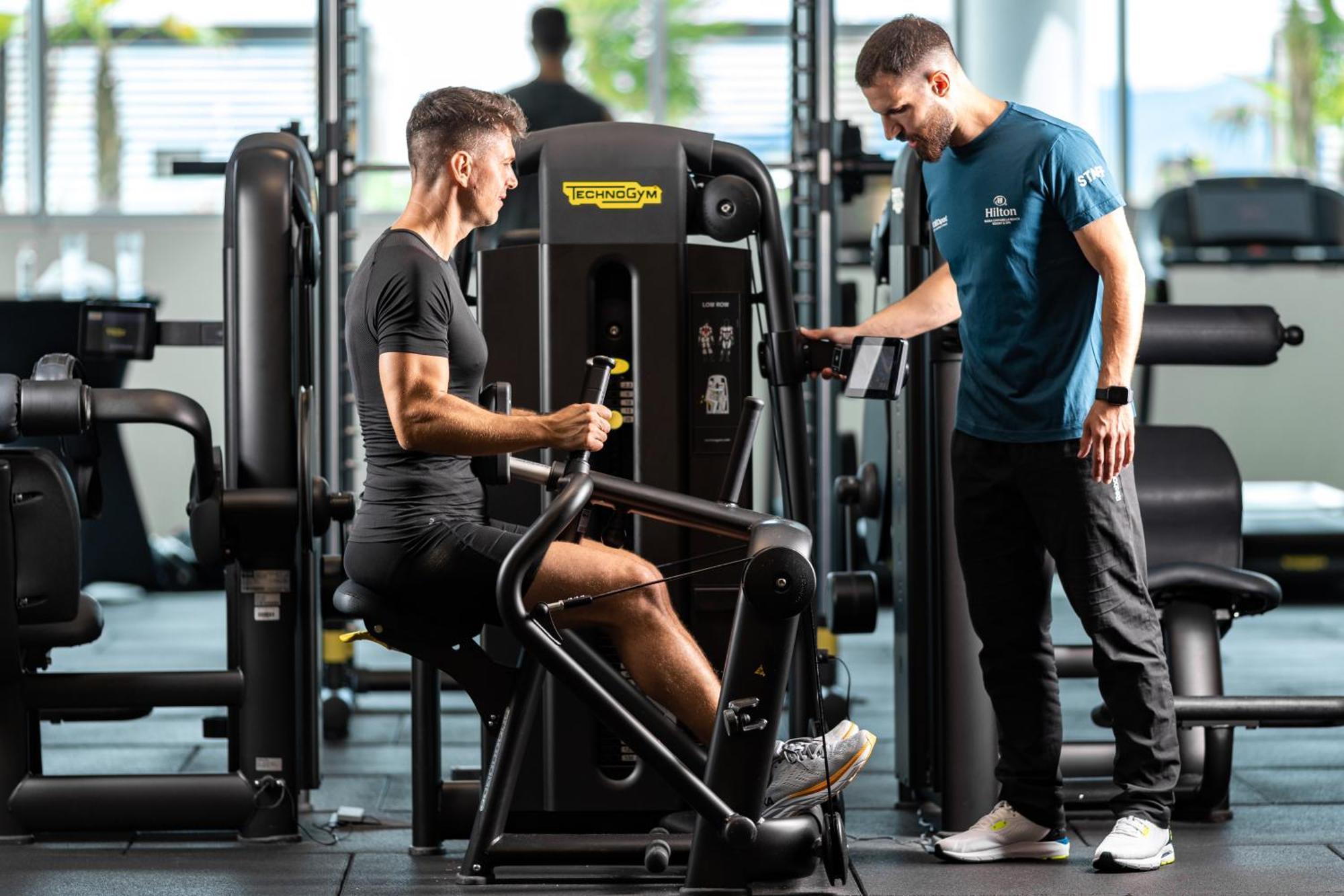 Hilton Rijeka Costabella Beach Resort And Spa Екстериор снимка Personal trainer with a client